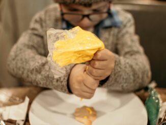 a person holding a piece of paper