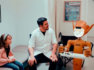 Doctor, girl, and robot in a medical room.